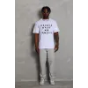 Unisex Oversize Baskılı Bisiklet Yaka T-Shirt - Beyaz - 93232 Unisex Oversize Baskılı Bisiklet Yaka T-Shirt - Beyaz - 93232