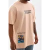 Unisex Bisiklet Yaka Baskılı Oversize T-Shirt - Bej - 103373 Unisex Bisiklet Yaka Baskılı Oversize T-Shirt - Bej - 103373