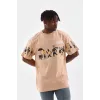 Unisex Bisiklet Yaka Baskılı Oversize T-Shirt - Bej - 103378 Unisex Bisiklet Yaka Baskılı Oversize T-Shirt - Bej - 103378