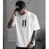 Unisex Bisiklet Yaka Baskılı Oversize T-Shirt - Beyaz - 109029 Unisex Bisiklet Yaka Baskılı Oversize T-Shirt - Beyaz - 109029